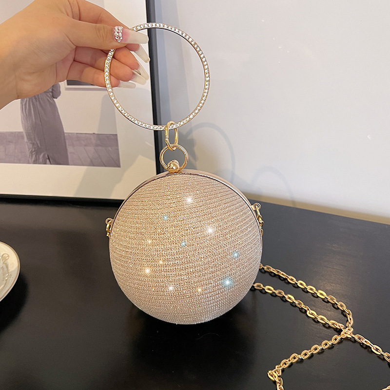 A niche design round ball bag for women, a new high-end hand-held crossbody chain small bag, a dinner bag, and a mini red envelope full figure