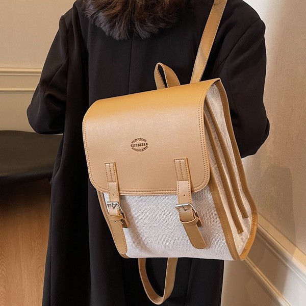 A fashionable autumn and winter new large-capacity backpack with contrasting colors, a versatile student schoolbag, and a retro color-blocked commuting backpack Specification drawing