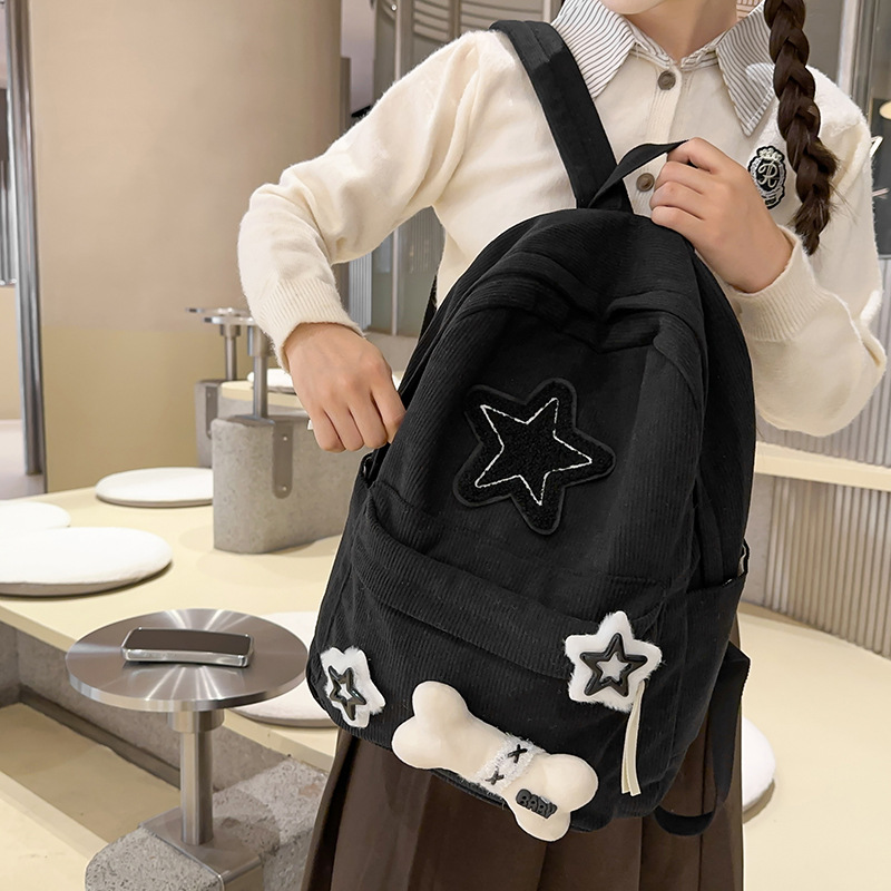 The new schoolbag is cute with star-shaped bones. It has a high appearance level and a niche design sense. It is a lightweight backpack and a school backpack for middle school students Specification drawing