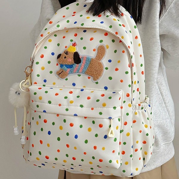 The new trendy polka dot puppy backpack is a versatile bag with a large capacity, reducing burden and protecting the spine full figure
