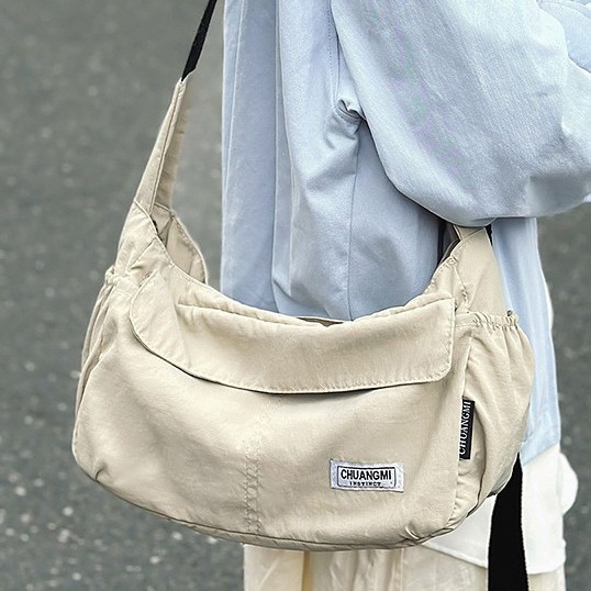 Postman bag, couple single-shoulder crossbody bag, Korean-style casual water-resistant nylon backpack, fashionable travel small crossbody bag full figure