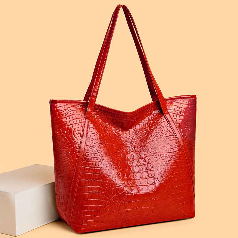 A new large-capacity crocodile-patterned tote bag with a retro European and American style for women, a casual and versatile commuting shoulder bag full figure