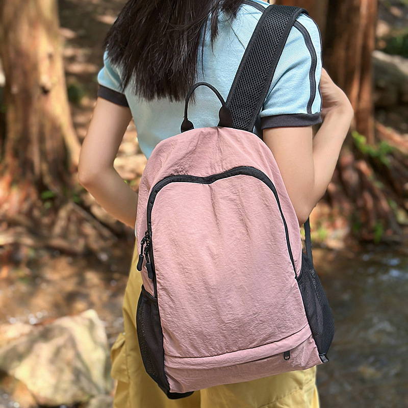 Outdoor cycling women's lightweight small backpack, lightweight and foldable hiking bag, multi-functional leisure travel backpack that can be stored details Picture