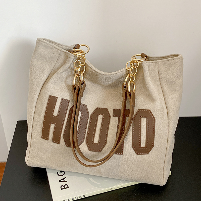 A large single-shoulder canvas bag for college students, a large-capacity women's 2022 new autumn commuter tote bag full figure