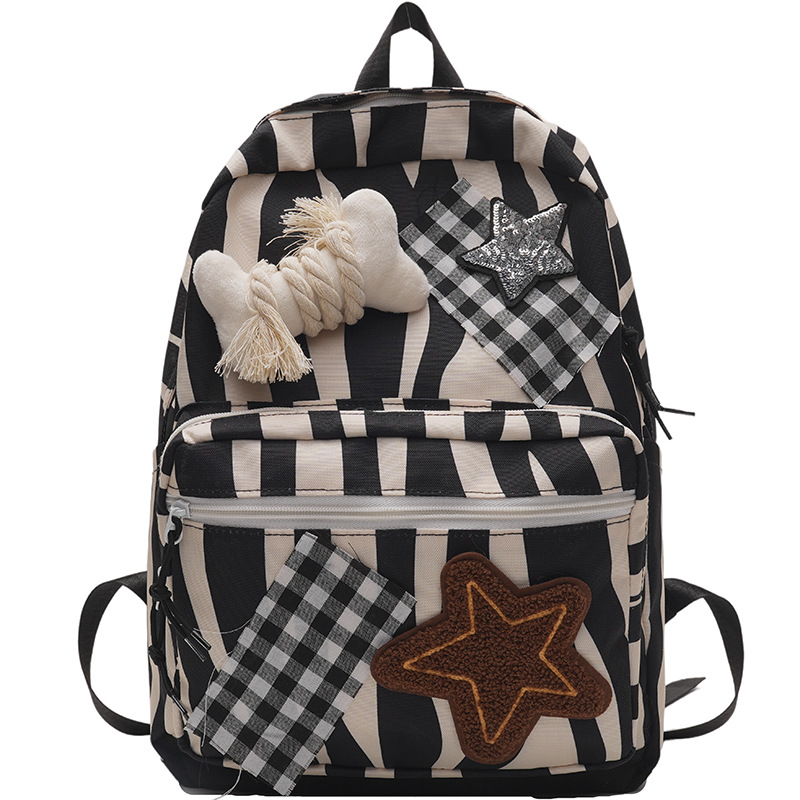 New autumn and winter unisex backpacks featuring star-shaped plush, cute bones, versatile and large-capacity zebra-patterned backpacks Item Picture