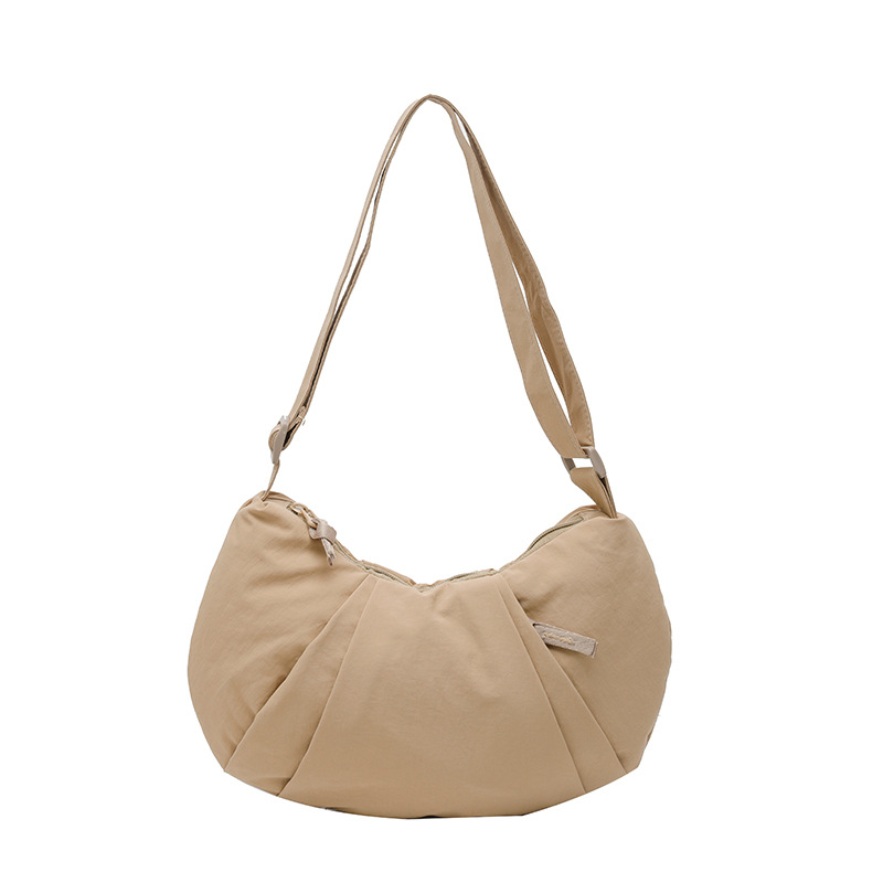 Spring 2025 new solid color, simple and versatile, large-capacity pleated single-shoulder crossbody bag, sporty style for making dumplings Item Picture