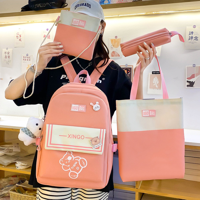 A four-piece set of lightweight and simple cartoon backpack for girls in grades three to six, a large-capacity Korean version backpack Application Scenario
