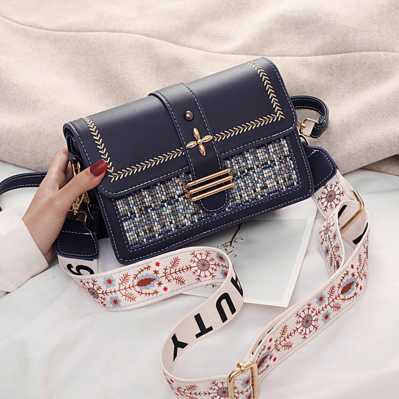 The new Spring/Summer 2022 small square crossbody bag by Bag Girl is fashionable and versatile. It features a checkered pattern and is a trendy Instagram student single-shoulder bag Application Scenario