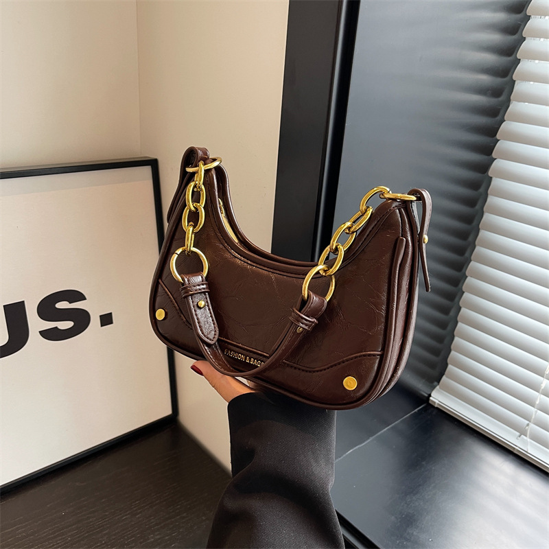 The 2023 new niche hand-held chain baguette underarm bag is a high-end and versatile single-shoulder crossbody bag for commuting details Picture