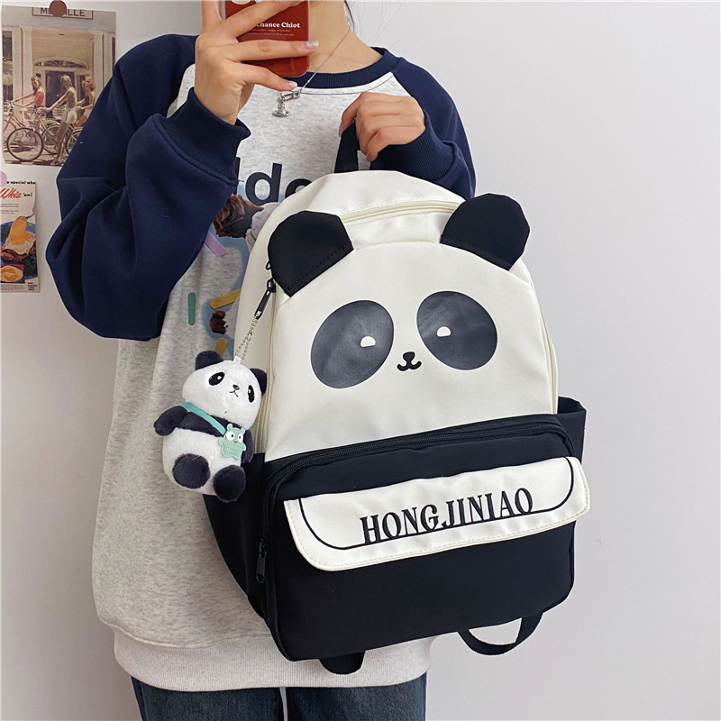 New checkered versatile casual girl backpack, cute cartoon panda schoolbag, girls' primary and junior high school students' backpack details Picture