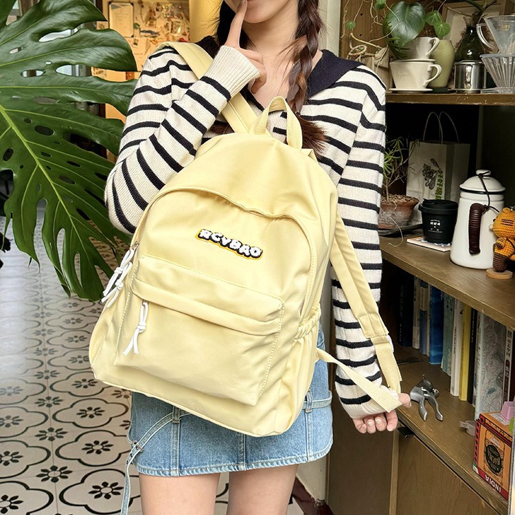 A cute and casual ultra-light backpack in macaron color for cross-border use in 2024. It's a versatile and lightweight casual backpack Specification drawing