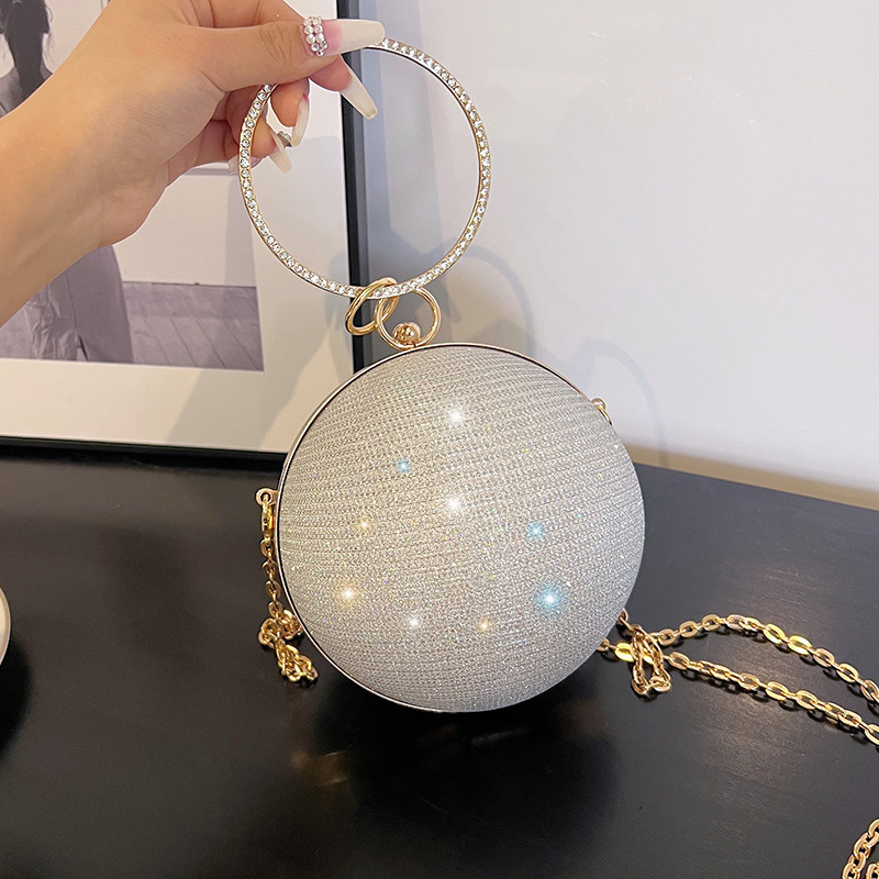 A niche design round ball bag for women, a new high-end hand-held crossbody chain small bag, a dinner bag, and a mini red envelope Application Scenario