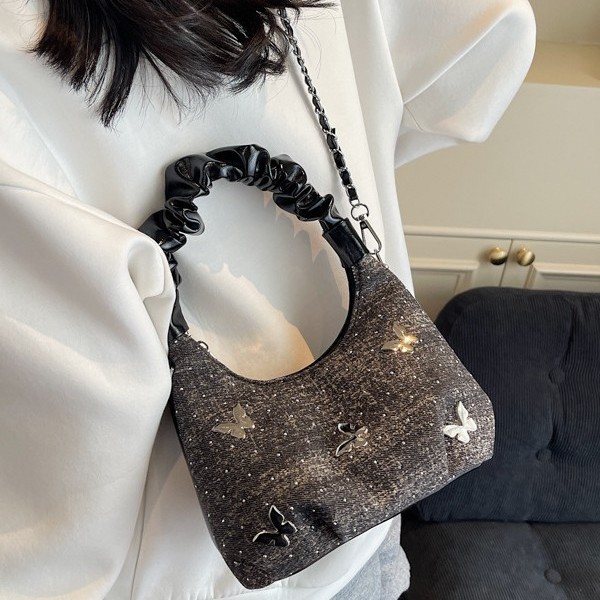 A new summer single-shoulder crossbody bag with a bow under the armpit, featuring a unique Korean texture silver bag details Picture