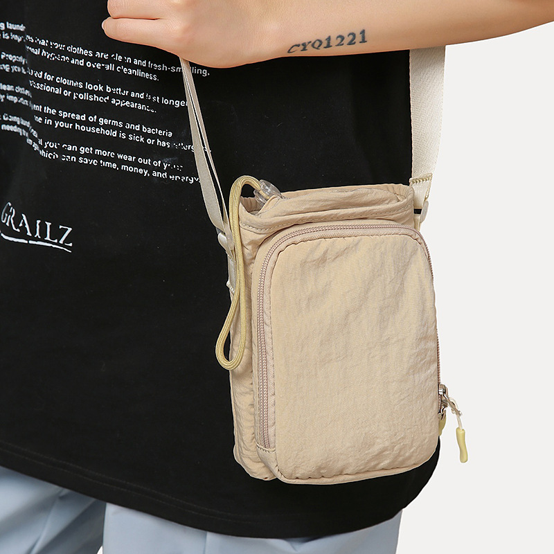 2025 New daily trendy casual sports lightweight hiking bag, trendy casual sports lightweight water cup bag crossbody bag full figure