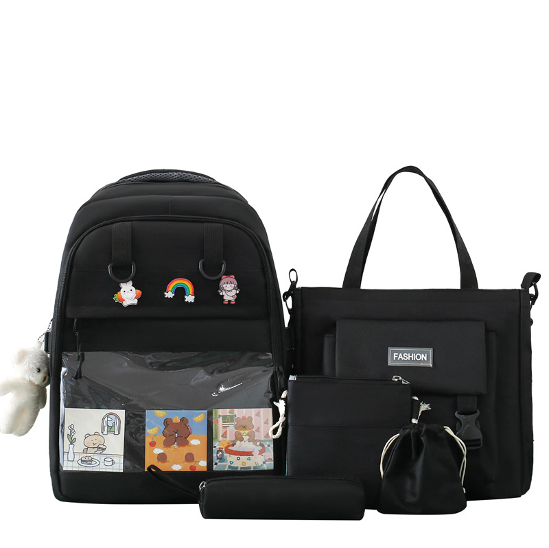 A new large-capacity four-piece schoolbag for girls, a lightweight back-protecting backpack with contrasting colors, and a storage backpack for middle school students Item Picture