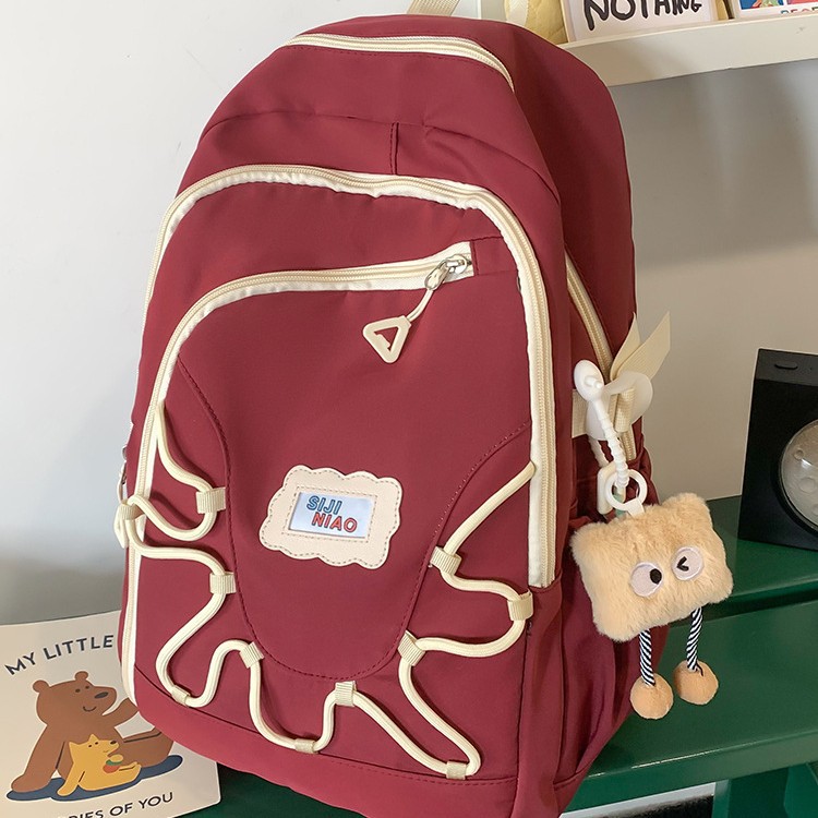 The 2024 new color-blocking creative backpack is a versatile and casual backpack for college students and a casual schoolbag for junior and senior high school students Application Scenario