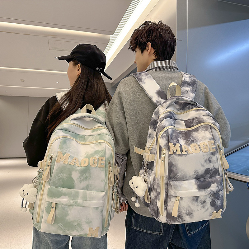 A new Japanese-style ins tie-dyed schoolbag with a large capacity for students and a fresh backpack for Harajuku junior high school students full figure