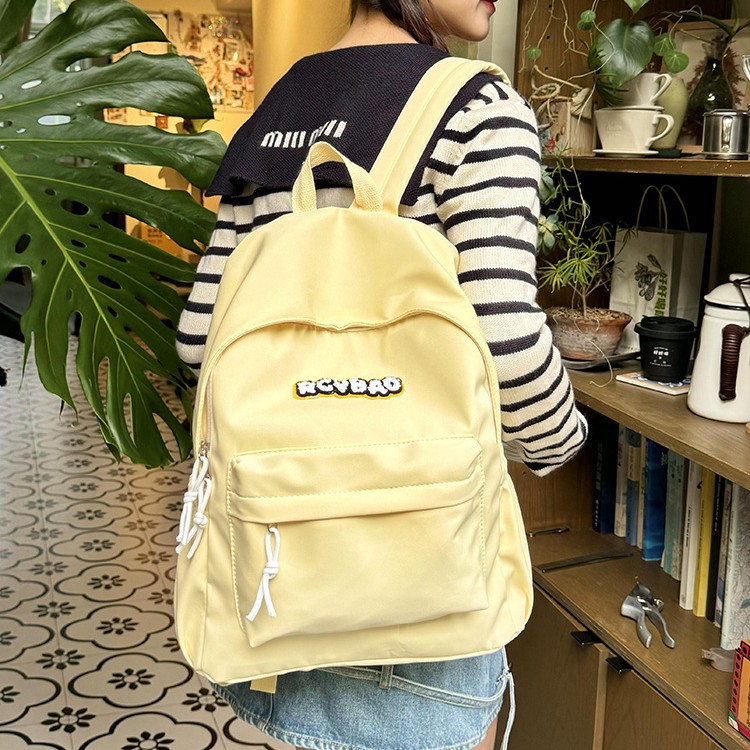A cute and casual ultra-light backpack in macaron color for cross-border use in 2024. It's a versatile and lightweight casual backpack details Picture