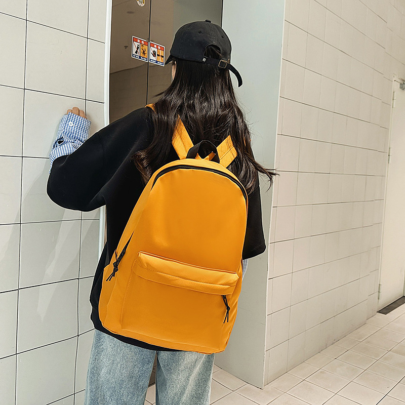 New travel minimalist schoolbag, student backpack, versatile, casual, large-capacity, lightweight solid color backpack for college students Application Scenario