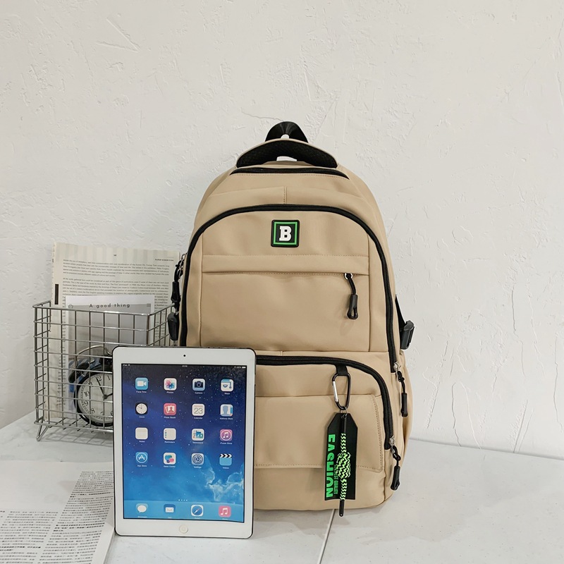 2024 Bestseller Durable multi-functional large-capacity solid-color schoolbag for boys and girls, primary and junior high school students, multi-layer trendy bag details Picture