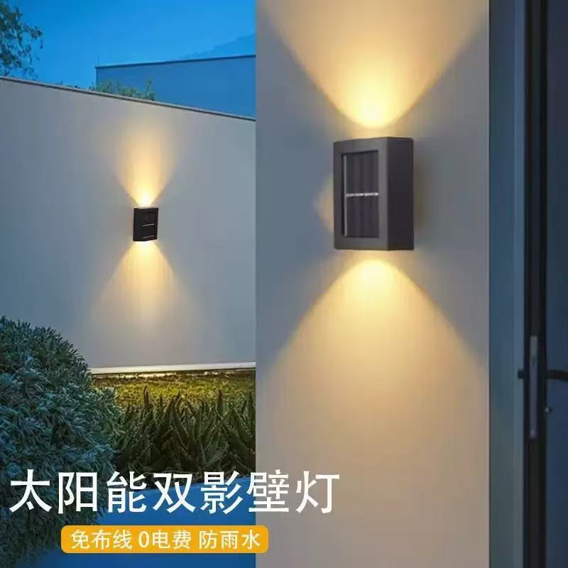 Solar outdoor garden lamp, household wall lamp, decorative arrangement, fence washing, new style of top and bottom luminous atmosphere wall lamp full figure