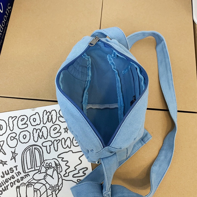 2022 New Summer small bags, women's single-shoulder bag, washed canvas bag, Korean-style mini phone bag, artistic crossbody bag Application Scenario