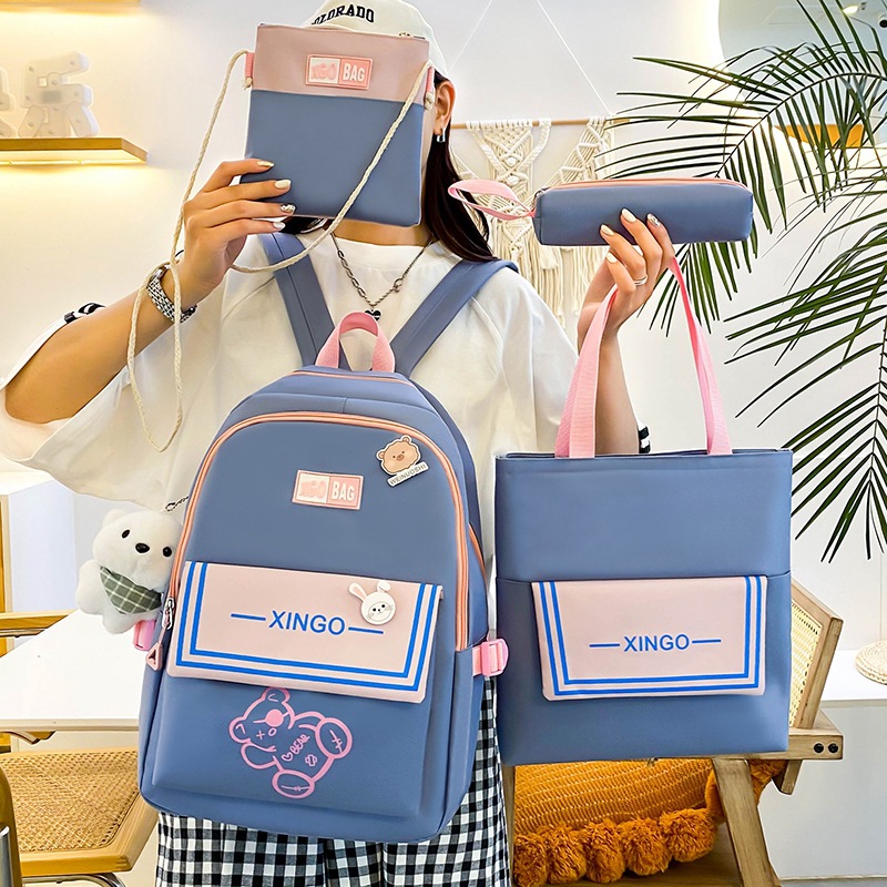 A four-piece set of lightweight and simple cartoon backpack for girls in grades three to six, a large-capacity Korean version backpack details Picture