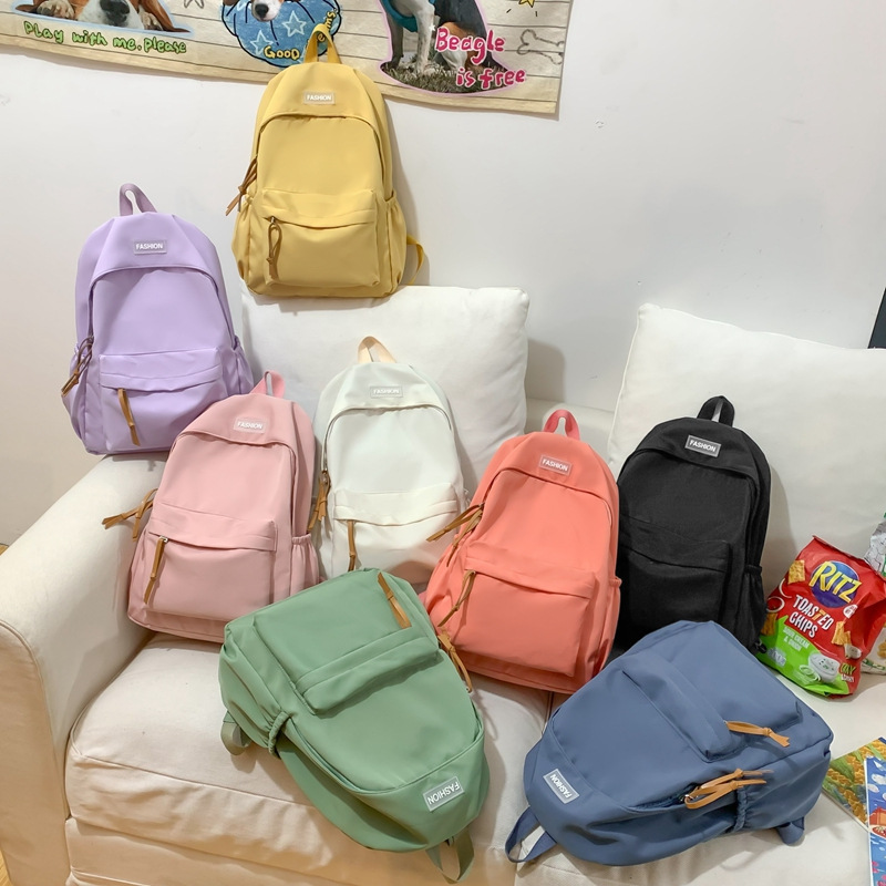 Wholesale of new solid-color backpacks, Korean version of ins schoolbags for junior high school, senior high school and college students, and large-capacity backpacks for leisure travel Specification drawing