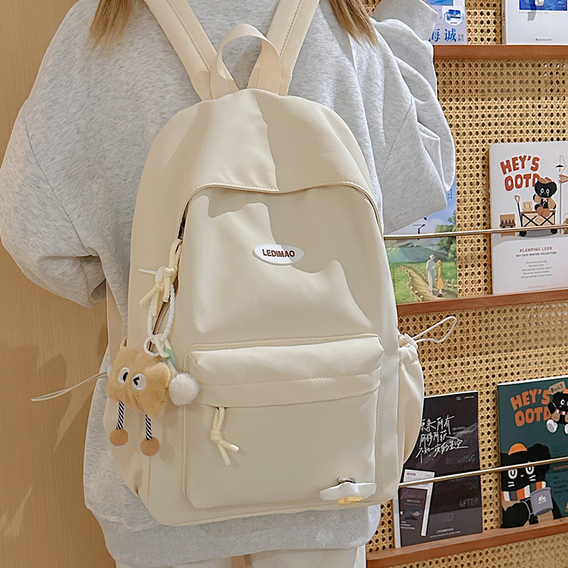 New solid-color college backpack for students, Korean-style Instagram student class bag, lightweight commuting backpack details Picture