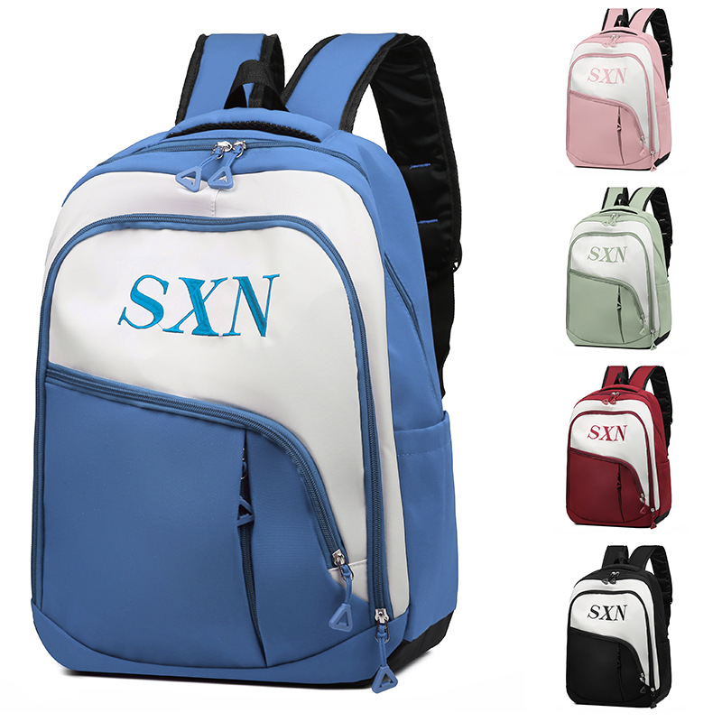 A new Korean-style trendy backpack with a large capacity and a simple color contrast for junior high school students' travel Item Picture