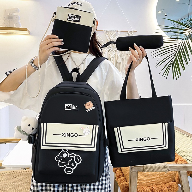 A four-piece set of lightweight and simple cartoon backpack for girls in grades three to six, a large-capacity Korean version backpack Specification drawing