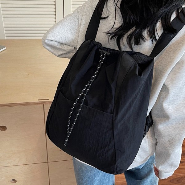 Men's and women's commuting casual sports nylon bag, waterproof single-shoulder bag, flash drawstring, large-capacity travel lightweight backpack Specification drawing