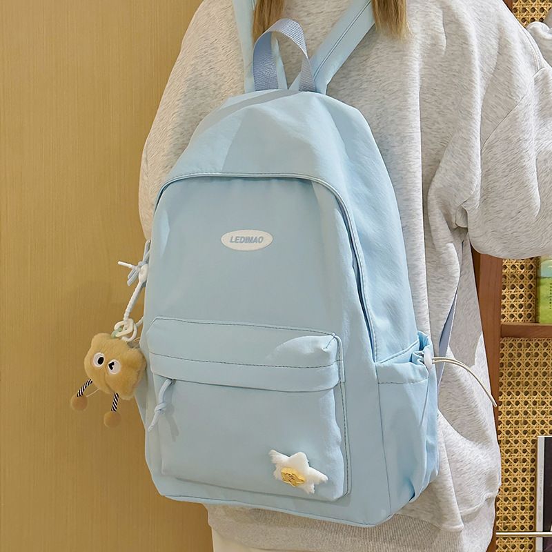 New solid-color college backpack for students, Korean-style Instagram student class bag, lightweight commuting backpack full figure