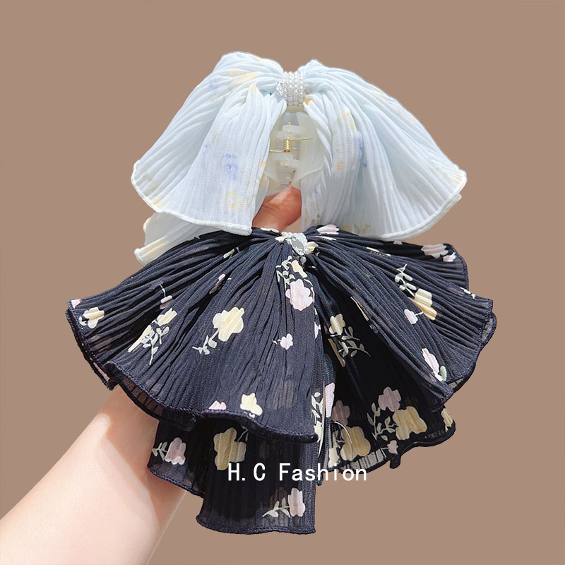 A new Korean floral tie-dye bow hairpin with a high-end feminine touch, a niche Instagram top clip at the back of the head, and a stylish hairpin details Picture