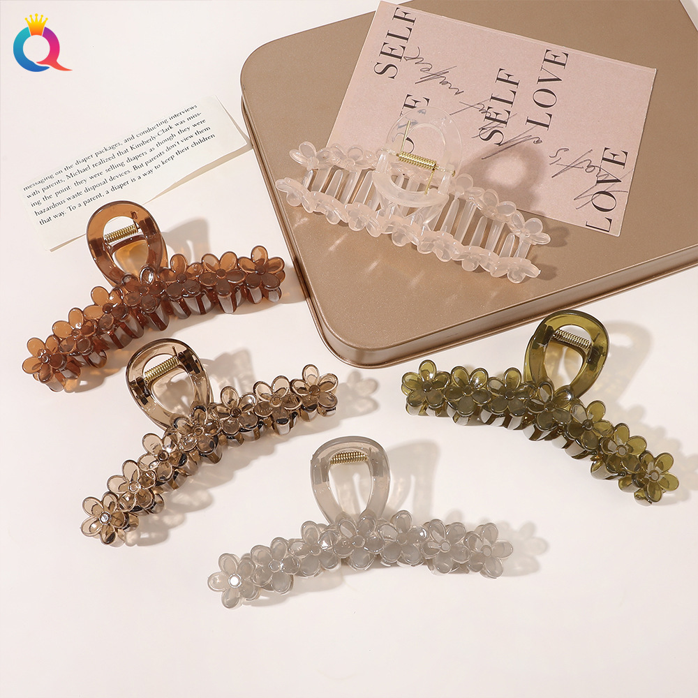 Wholesale of Qiyue large-sized hair clips with a high-end style, flower hair clips, hair curls, back of the head, shark hair clips, and women's hair accessories full figure