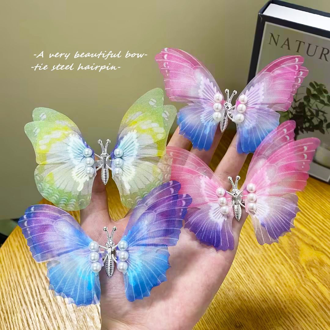 Wholesale of high-end children's headwear and hair accessories for spring and summer, hair clips for little girls, gradually changing and moving butterfly hair clips full figure