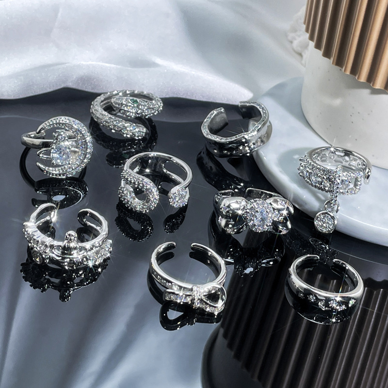 A high-end, light luxury, full diamond Saturn open ring for women on Instagram, with a cold and elegant style, sweet and cool ring trend for autumn and winter accessories details Picture
