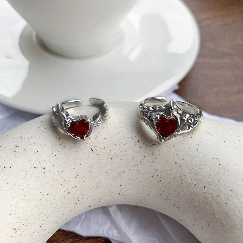 The heart-shaped red zircon high-end and elegant open ring is a unique and niche design for women, featuring a light luxury and simple fashion Application Scenario