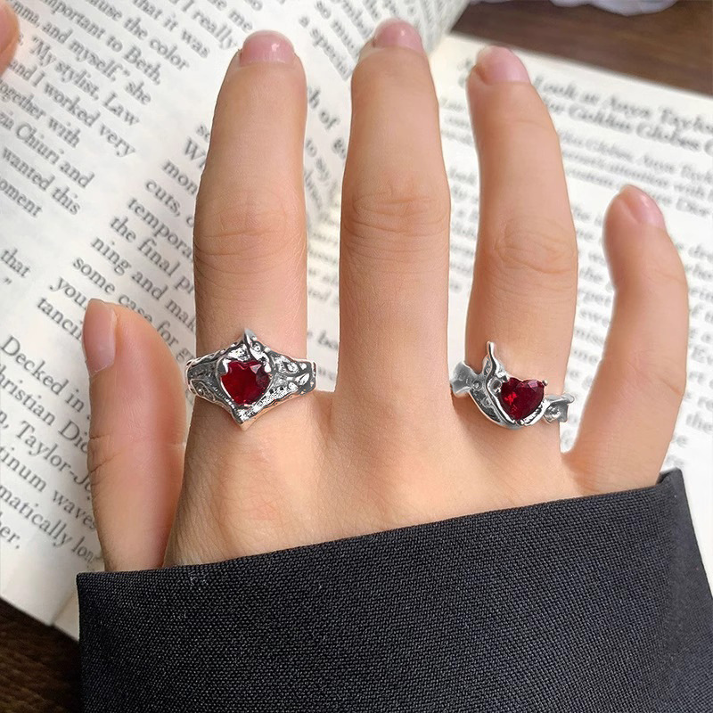 The heart-shaped red zircon high-end and elegant open ring is a unique and niche design for women, featuring a light luxury and simple fashion details Picture