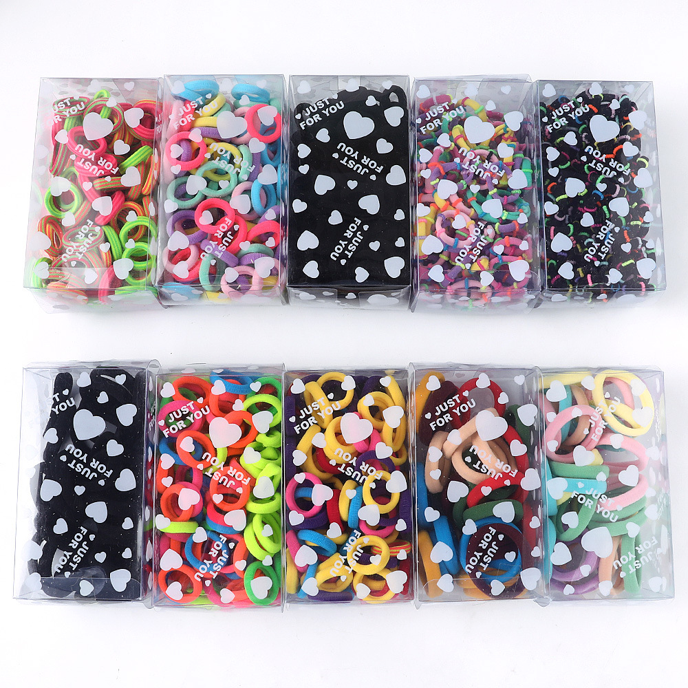 Factory wholesale candy-colored towel loops, heart-shaped boxes, basic hair bands, simple and seamless towel loops and hair ties full figure