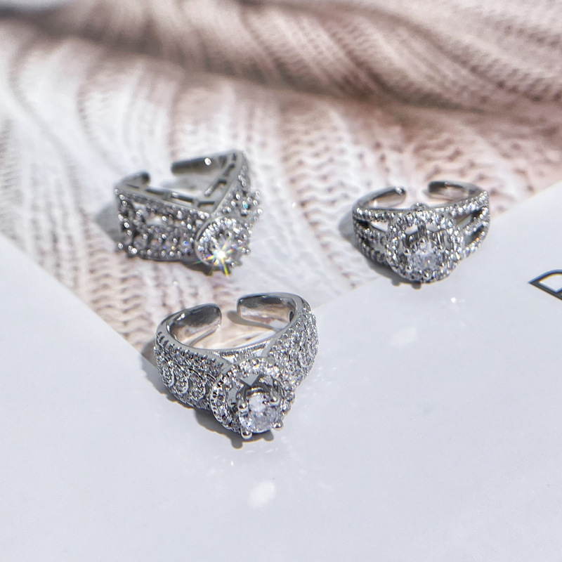 In the year of one's zodiac sign, cross-border light luxury wedding rings from Europe and America are in vogue. Full-diamond open-top rings are a niche, fashionable and high-end trend for women details Picture
