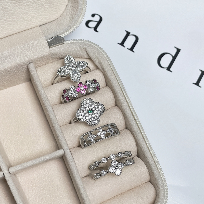 A new Korean-style light luxury four-leaf clover full-diamond open ring for women's Instagram, with a cold and unique style and exquisite index finger ring Specification drawing