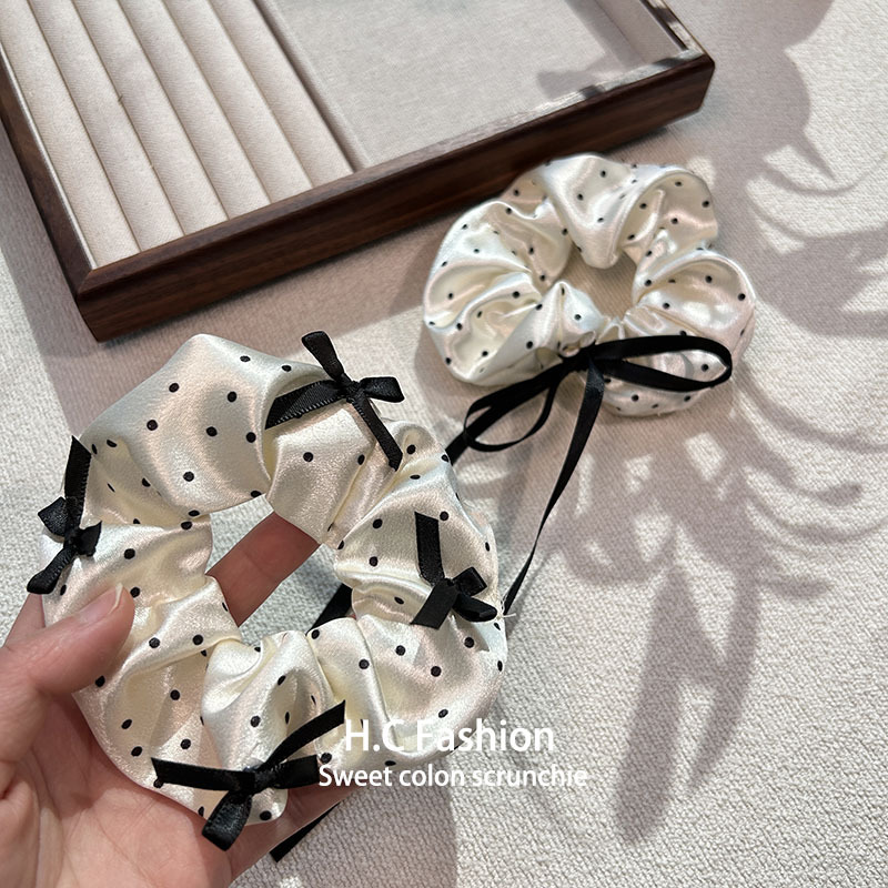 Gentle satin polka dot bow tie large intestine hair band, French niche retro hair tie, bun hairstyle, leather band hair tie Application Scenario