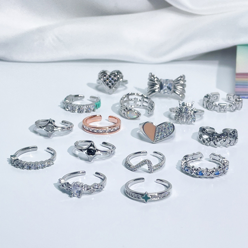 This is an irregular-textured bow, heart-shaped, open-mouth ring with an ins niche design and a light luxury index finger ring details Picture