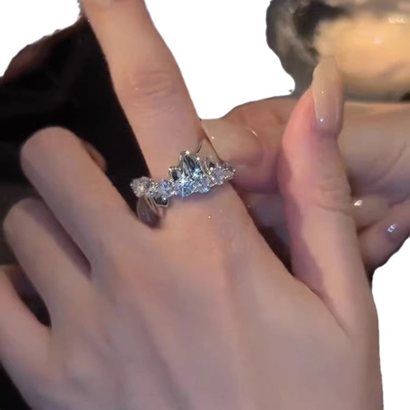 A high-end zircon cross ring for women's ins, with a cold, light luxury and niche design. It's a simple and elegant index finger ring Item Picture