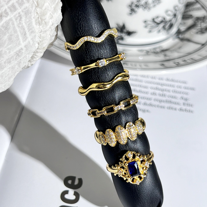 A trendy, slightly inlaid blue diamond lace open ring in the style of ancient Chinese coins, a simple and individual cold style index finger ring for women Specification drawing