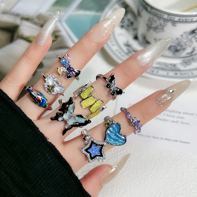 Sweet and cool Korean-style butterfly drip glaze high-end open ring, a unique and niche design for women, a cold and elegant style ring full figure