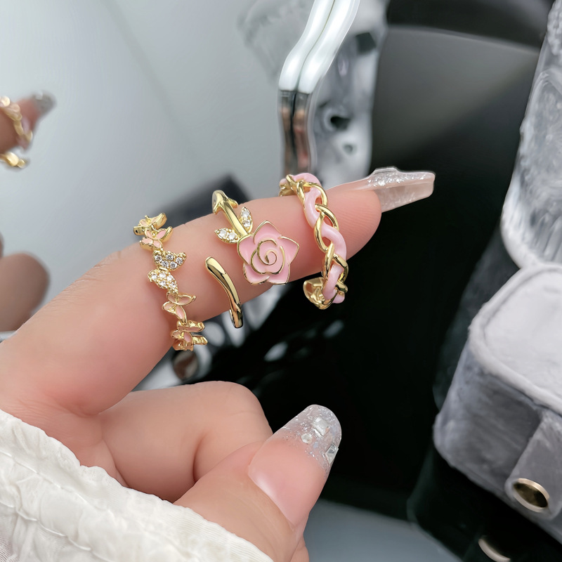 A high-end, sweet and cool pink glazed flower butterfly woven open ring, a light luxury, fashionable and versatile ring for women to wear in layers Application Scenario