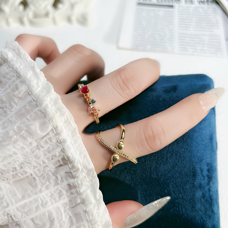 The golden circular line diamond planet brushed ring is a unique and creative design for women with colorful diamonds. It is a fashionable and personalized ring trend details Picture