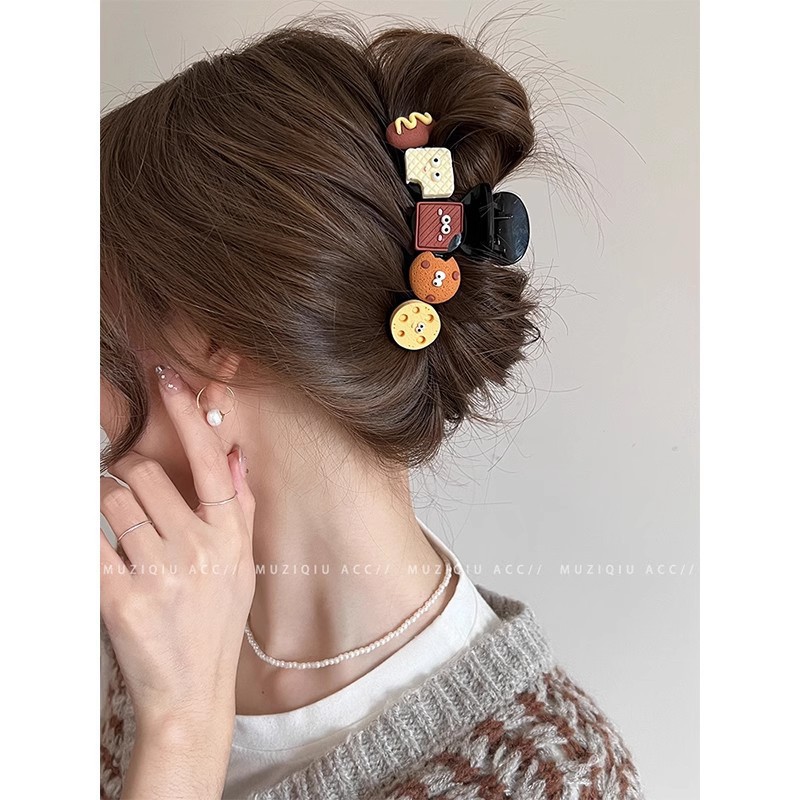 Cartoon food toy cookie hairpin, high-end hairpin at the back of the female head, cute bear claw clip, new shark clip hair accessory Application Scenario